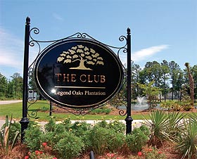 Photo of the sign for The Club at Legend Oaks Plantation in Summerville